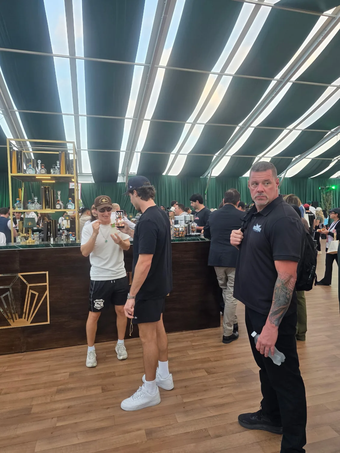James Gonzales of Shadow Securities providing close protection for Jack and the Yes Chef team inside the VIP tent at Yes Chef Food Fest, Citi Field