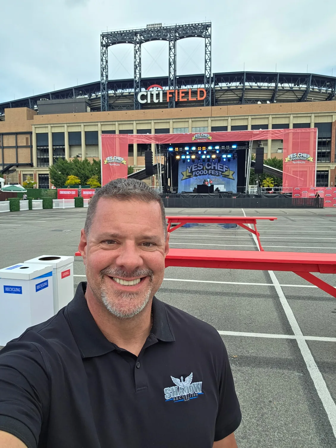 James Gonzales of Shadow Securities in a branded polo on the grounds of Citi Field during Yes Chef Food Fest