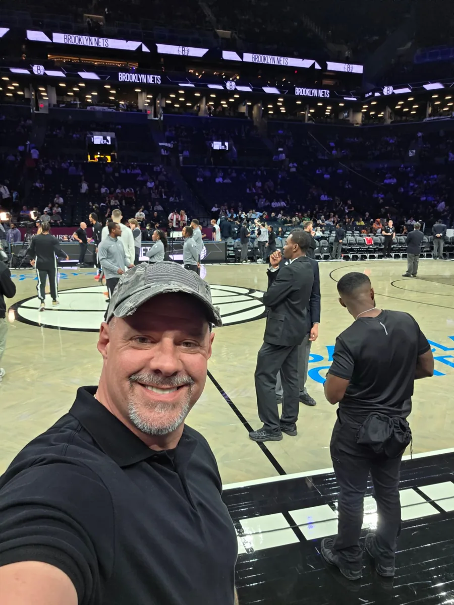 Shadow Securities agent providing event coverage courtside at Barclays Center in Brooklyn
